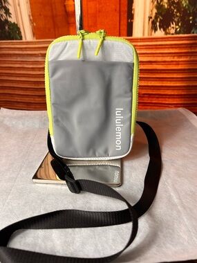 Lululemon Easy Access Crossbody bag in a gray and white colorblock neon accent